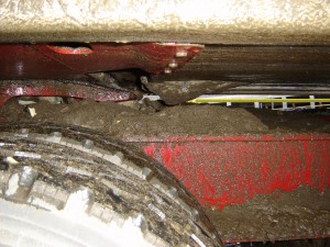 Snow, Ice, Sand and Rocks on Truck Undercarriage